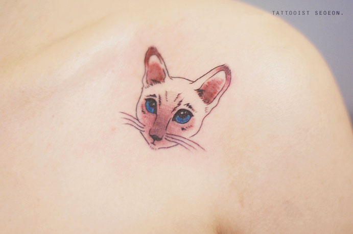 татуировка кот